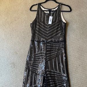 Sequence jumper, new with tag. Never worn.